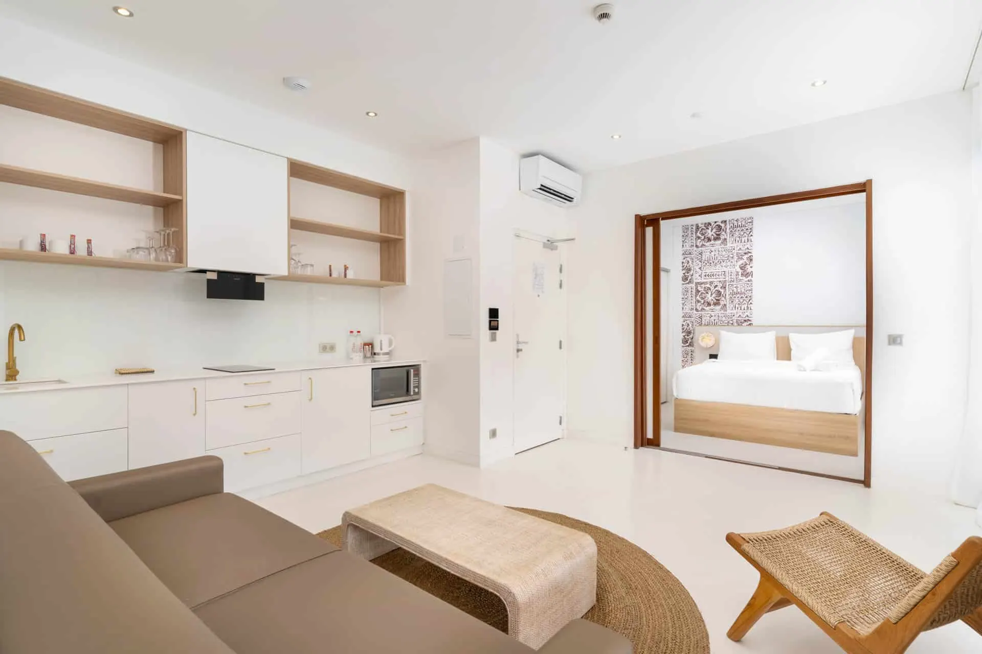 Living room and kitchenette of a family suite