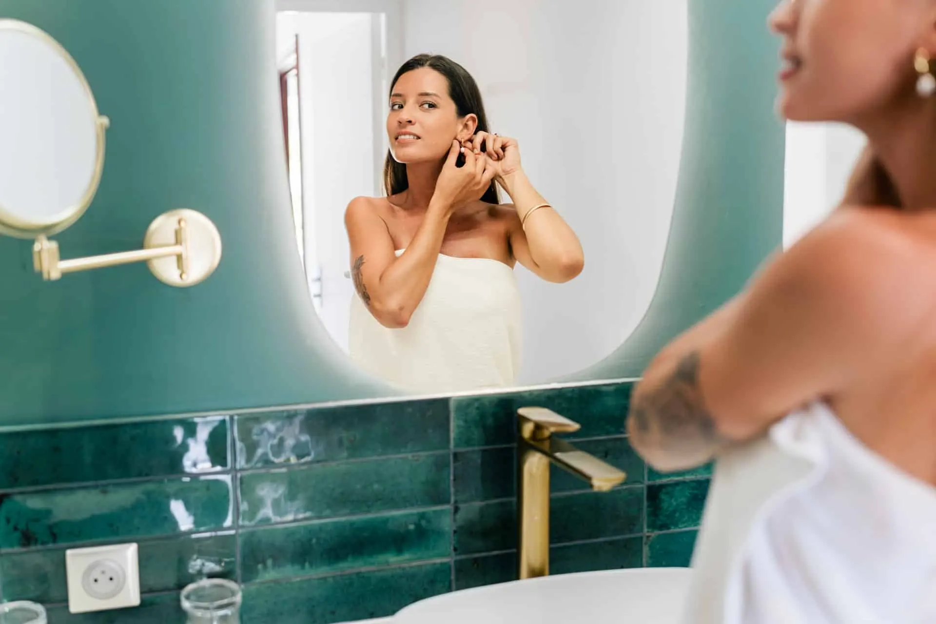 Woman in a suite bathroom